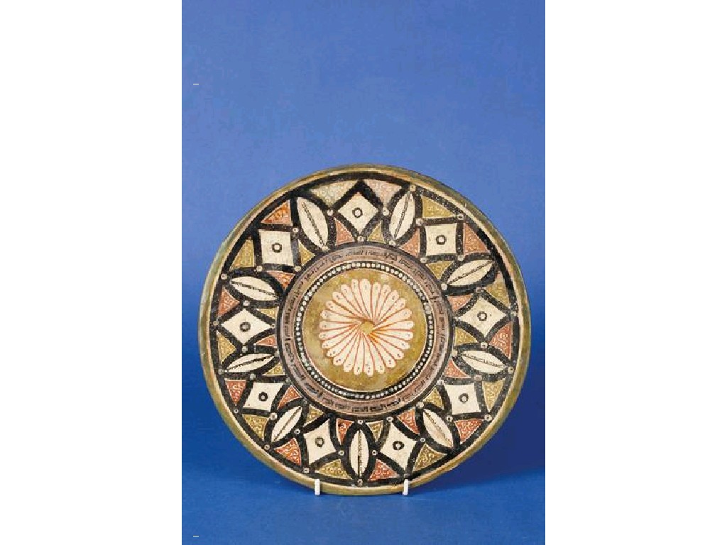 Appraisal: A PERSIAN POTTERY DISH decorated in polychrome with geometric decoration