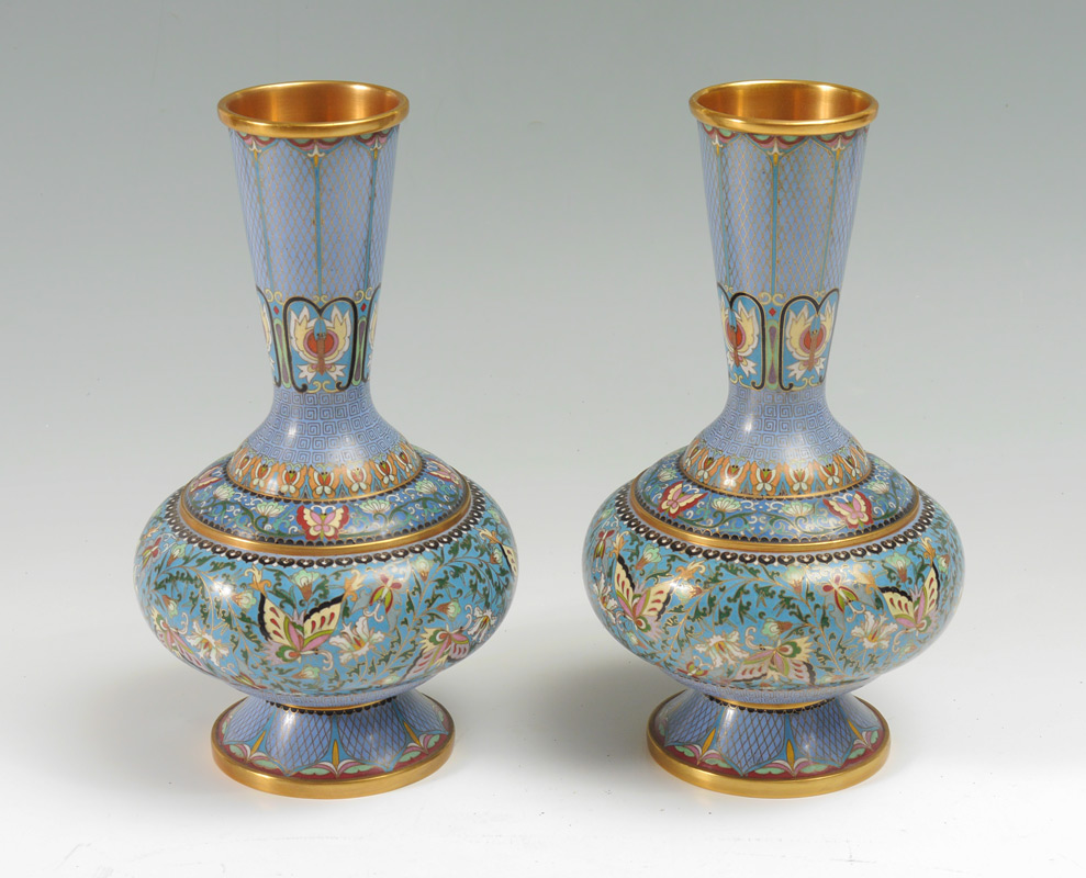 Appraisal: PAIR OF CHINESE BLUE CLOISONNE VASES Blue ground tapered neck