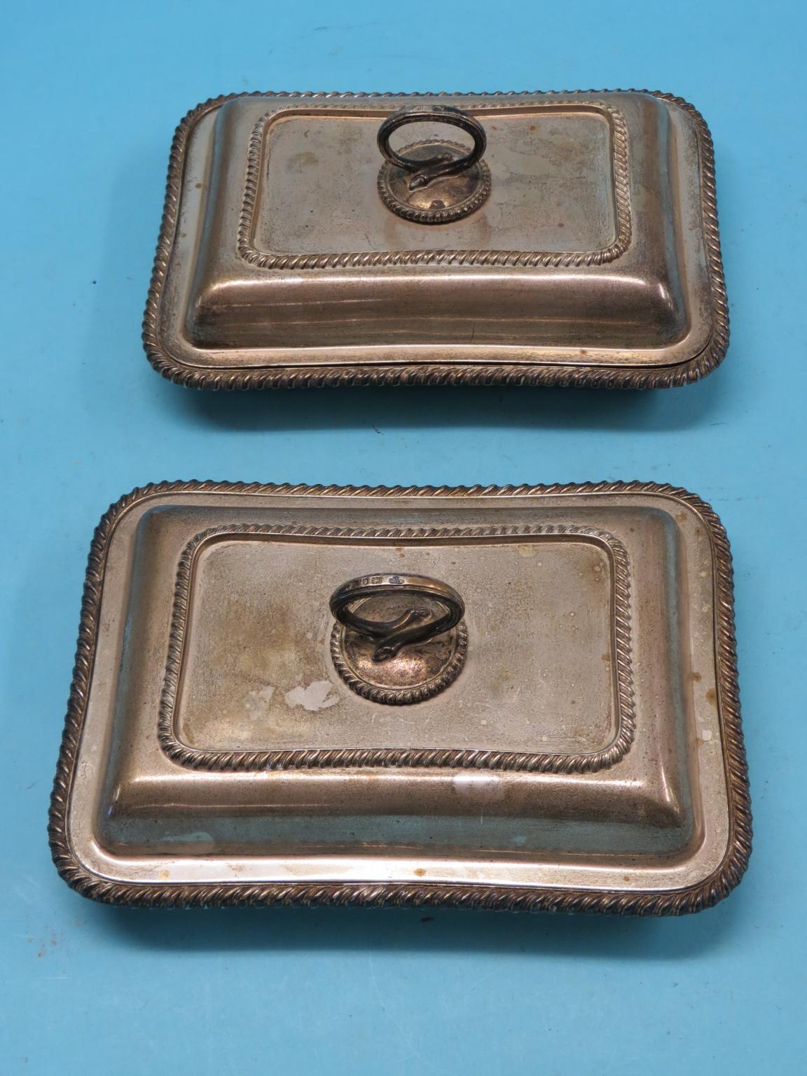 Appraisal: A pair of silver entree dishes covers with detachable handles