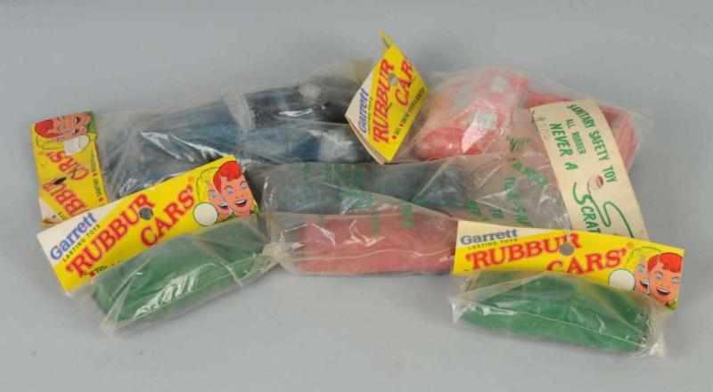 Appraisal: Lot of Rubber Garrett Car Toys Description Circa s All