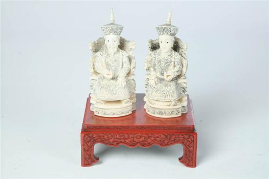 Appraisal: IVORY EMPEROR AND EMPRESS China st half- th century Seated