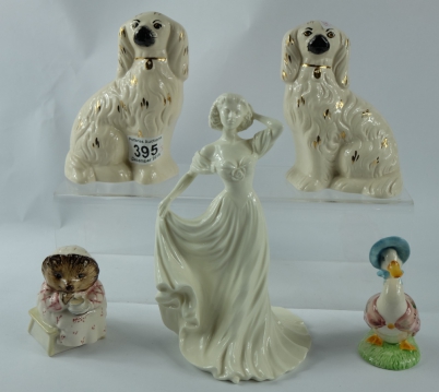 Appraisal: Coalport figure Lady Stephanie pair fireside seated spaniel dogs and