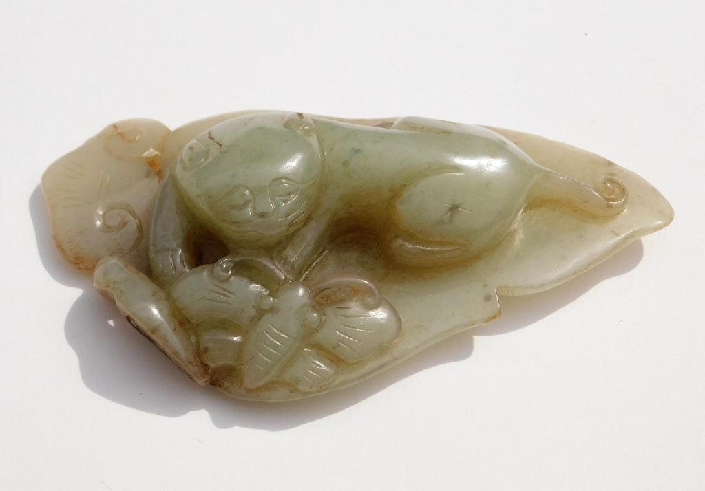 Appraisal: CHINESE QING DYNASTY CARVED JADE RUYI China Qing DynastyDepicts a