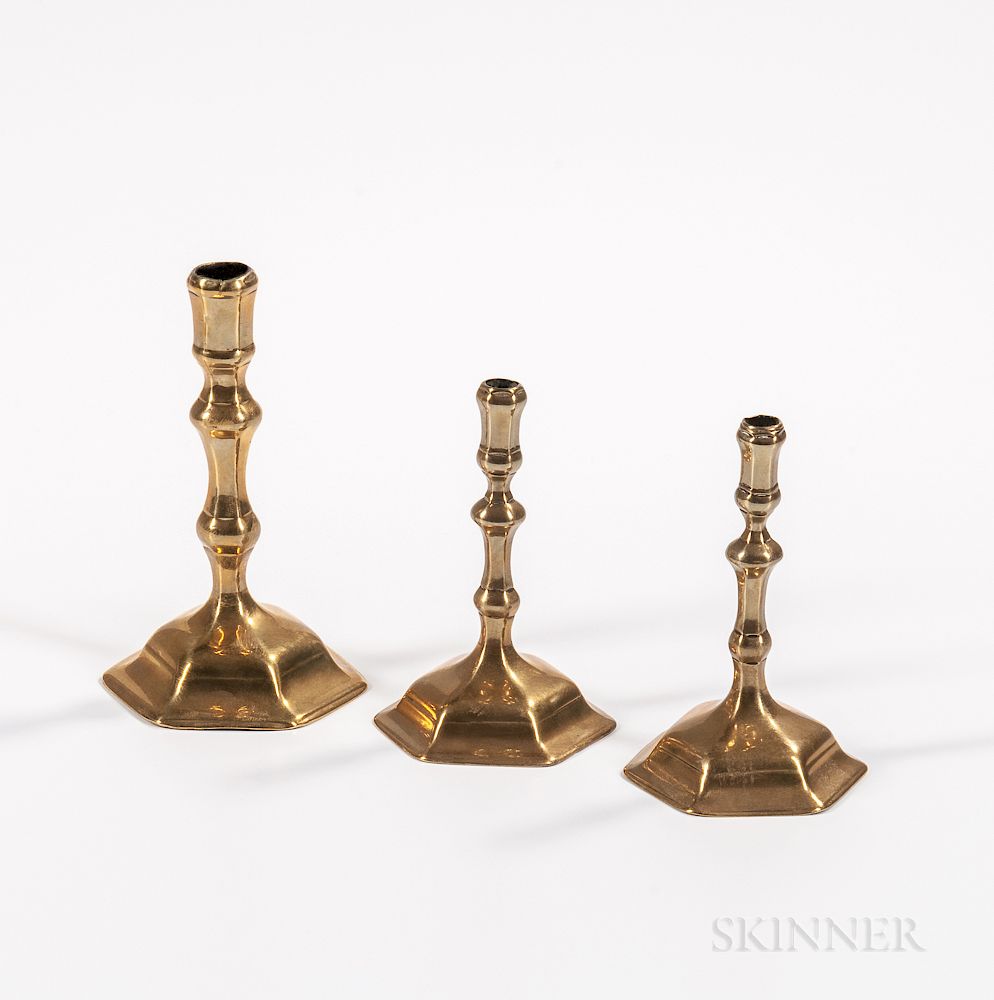 Appraisal: Two Hexagonal-base Tapersticks and a Hexagonal-base Candlestick Two Hexagonal-base Tapersticks