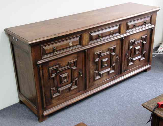 Appraisal: A th Century style oak moulded front dresser with three