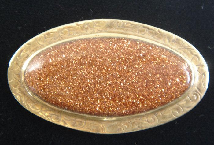 Appraisal: Unm K goldstone brooch l Estimate -