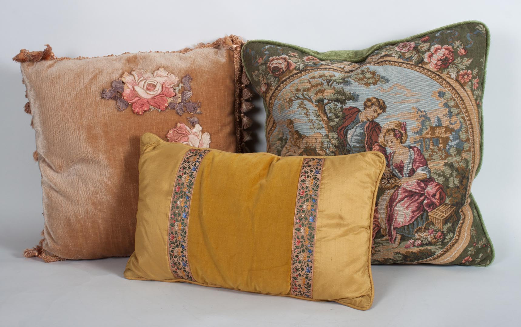 Appraisal: Three decorator throw pillows