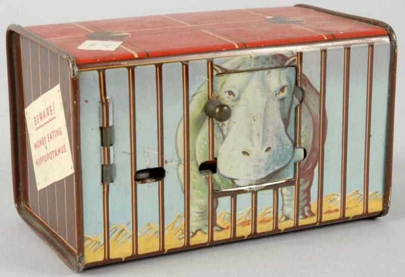 Appraisal: Tin Hippo in Cage Mechanical Bank Description European Rare Condition