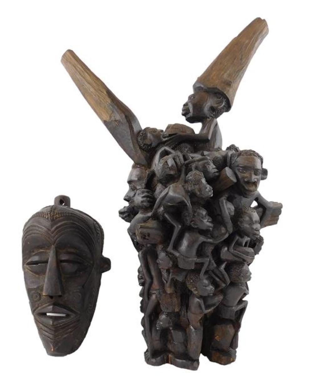 Appraisal: TRIBAL Two African carved wood dark finish pieces both made