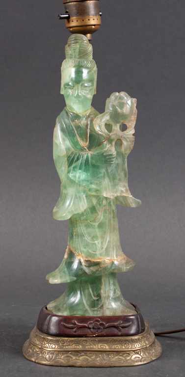 Appraisal: Chinese carved green quartz Quanyin figure mounted as a lamp