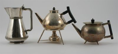 Appraisal: An electroplated metal teapot on stand the design attributed to