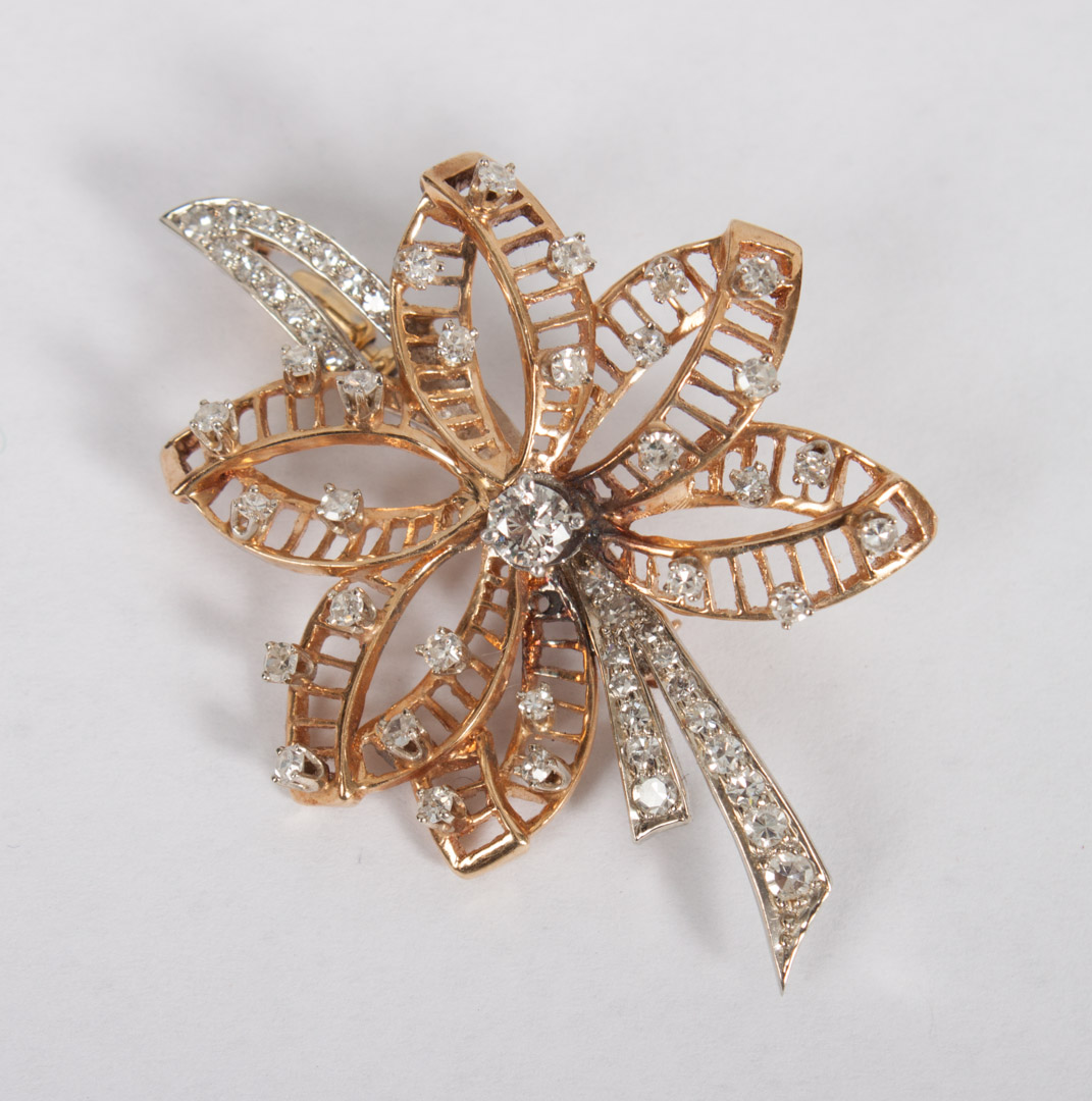 Appraisal: Lady's K yellow white gold diamond brooch modelled as a