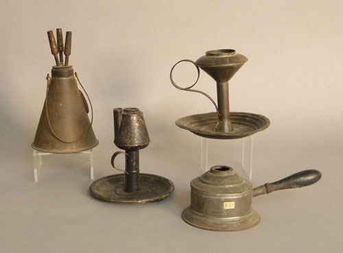 Appraisal: Four pieces of tin lighting th c Isaiah Jennings adjustable