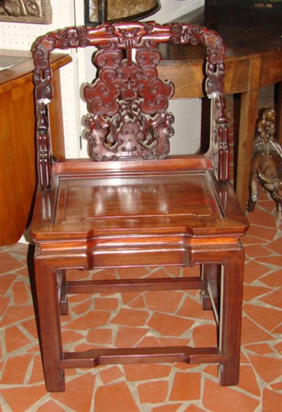 Appraisal: Chinese carved elm lowback chair circa carved crest centered with