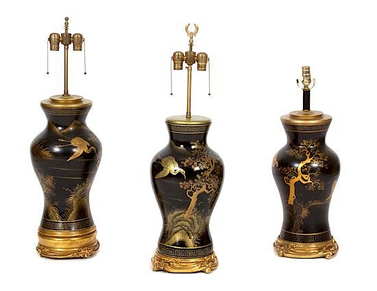 Appraisal: A Group of Three Ebonized and Parcel Gilt Table Lamps