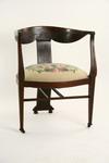 Appraisal: ARM CHAIR - Edwardian mahogany inlaid corner chair Shaped horseshoe