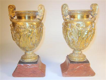 Appraisal: After the Antique a pair of Continental gilt Bronze urnsIn