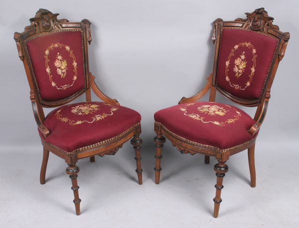 Appraisal: Joseph Lellef pair of walnut chairs having burlwood and black