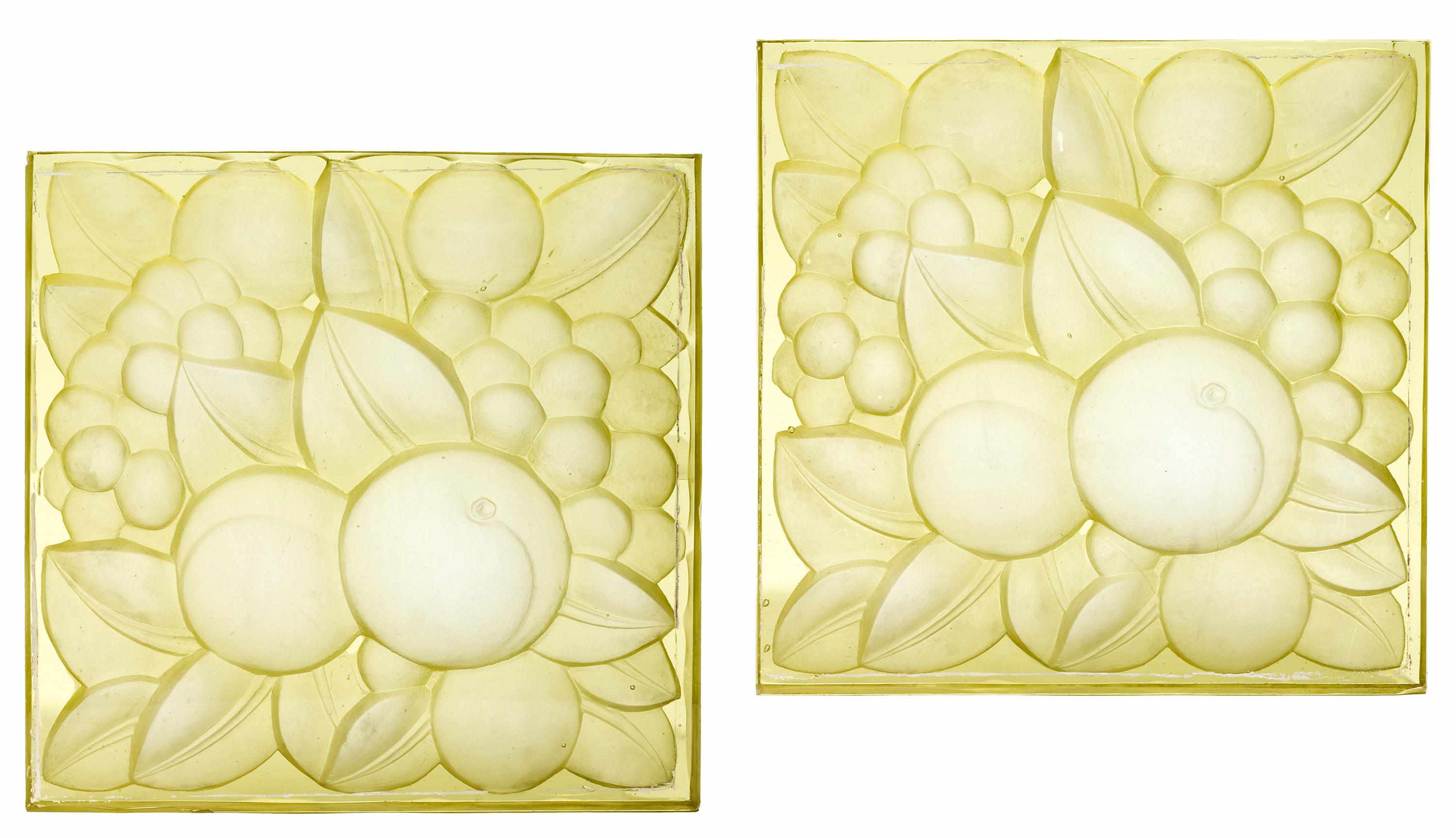 Appraisal: Two Ren Lalique molded yellow glass plaques Fruits commissioned for