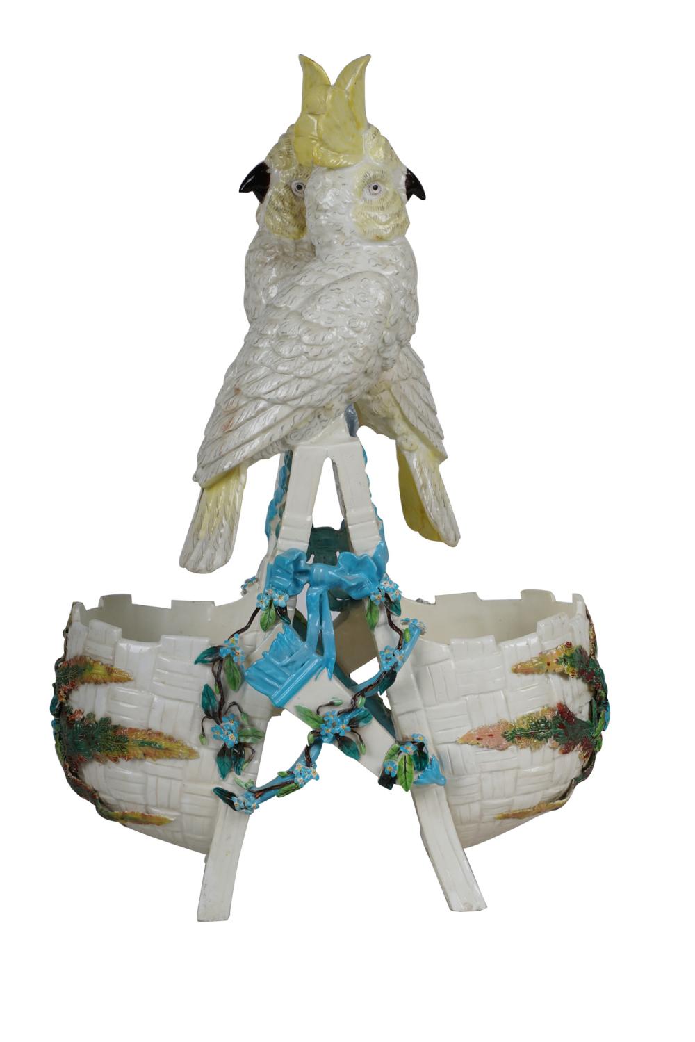 Appraisal: CONTINENTAL PORCELAIN BIRD GROUPtwo birds perched above two baskets inches