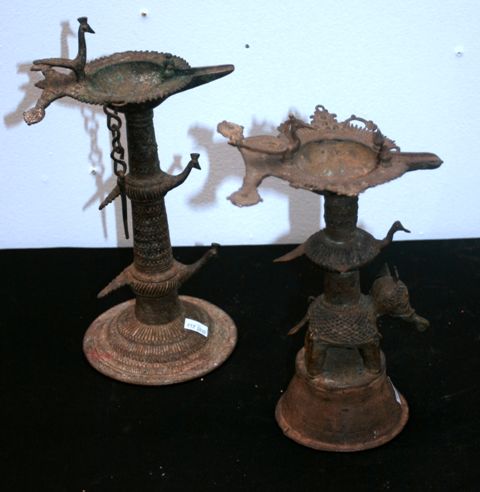 Appraisal: Two cast brass Dokra tribal oil lamps one cast with