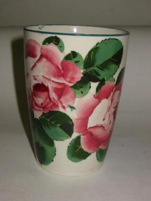 Appraisal: A WEMYSS POTTERY BEAKER painted with cabbage roses impressed Wemyss