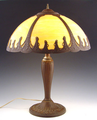 Appraisal: CARAMEL SLAG GLASS TABLE LAMP Bronzed metal base panel caramel