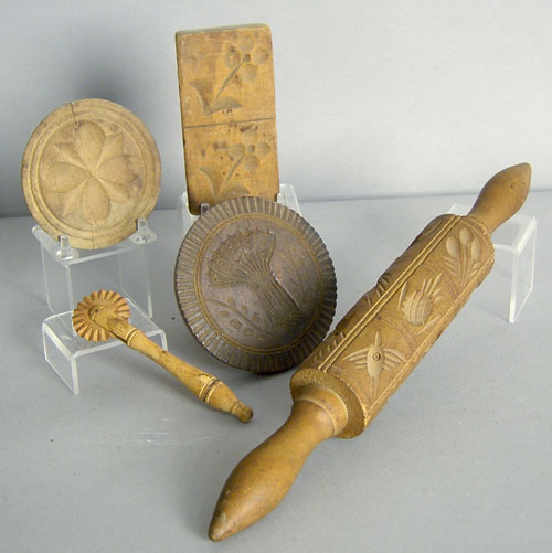 Appraisal: Three butterprints together with a jagging wheel and rolling pin