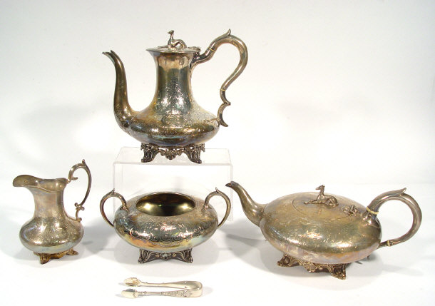 Appraisal: Four piece silver plated teaset the lids with greyhound knops