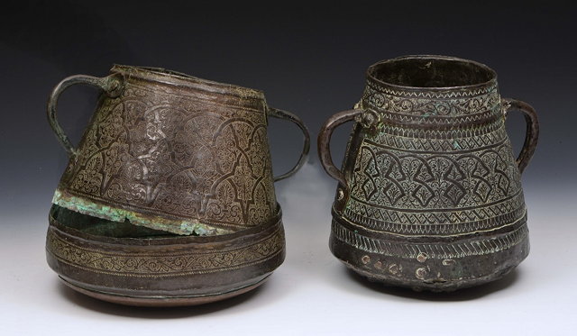 Appraisal: A TIMURID TINNED COPPER COOKING VESSEL with engraved interlaced foliate