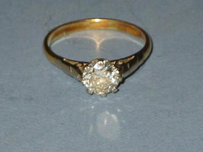 Appraisal: A SOLITAIRE DIAMOND RING the brilliant cut stone approximately cts