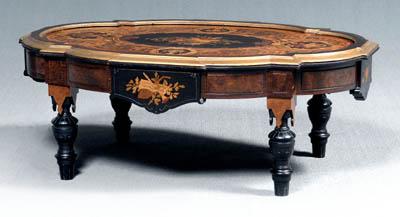 Appraisal: American aesthetic movement table cartouche shaped top with elaborate marquetry