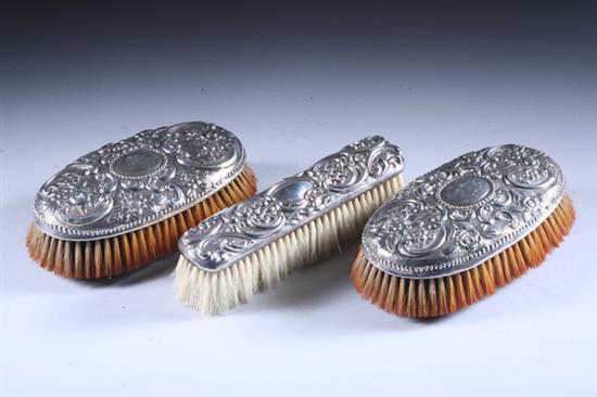 Appraisal: THREE VICTORIAN SILVER-MOUNTED CLOTHES BRUSHES Including a pair JR SA