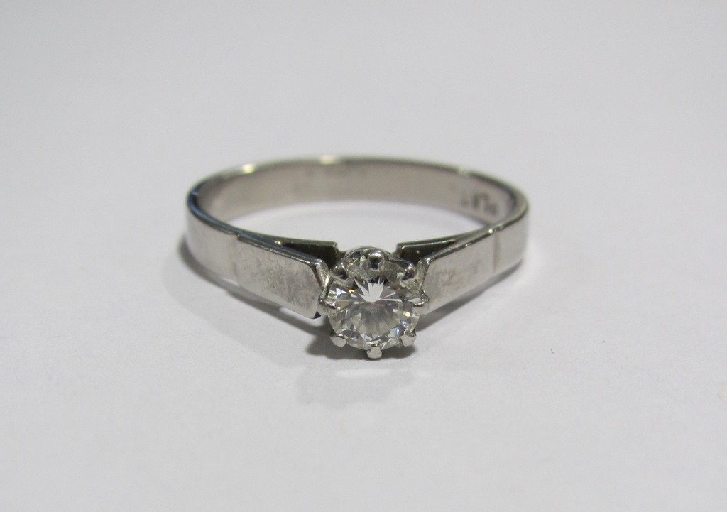 Appraisal: Platinum diamond solitaire ring with brilliant cut diamond measuring approximately