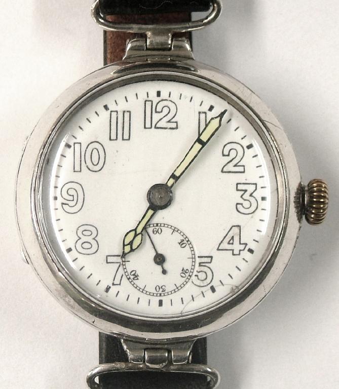 Appraisal: 's circular silver wire lug gentleman's wristwatch the white dial