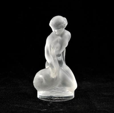 Appraisal: A Lalique Leda Figurine The figure kneeling on a circular