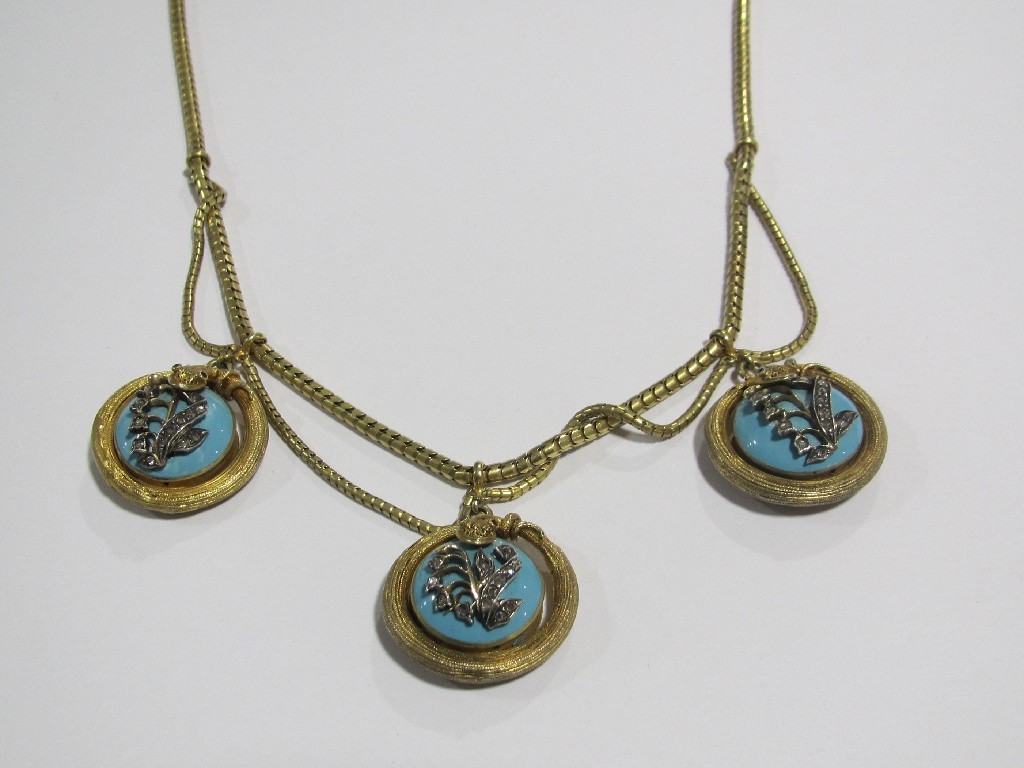 Appraisal: Victorian gold necklace with a fringe of three pendants made