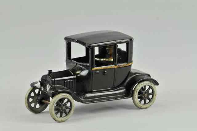 Appraisal: ARCADE MODEL ''T'' TWO DOOR SEDAN Cast iron painted in