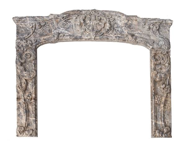 Appraisal: A Rococo style marble fire surround th century The serpentine