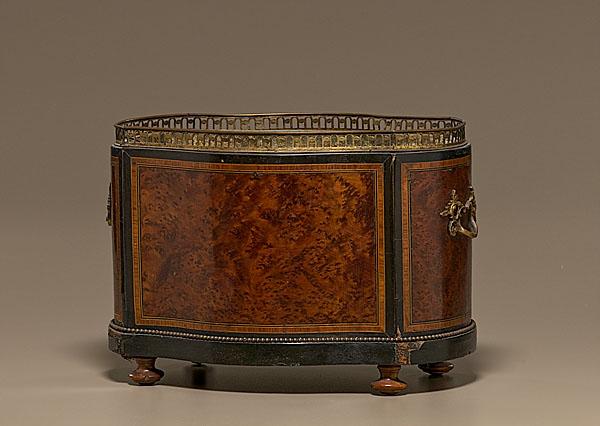 Appraisal: BURL JARDINIERE WITH GALLERY English th century Serpentine sides covered