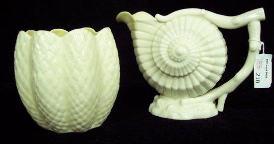 Appraisal: A Belleek cone vase cm high and a shell jug