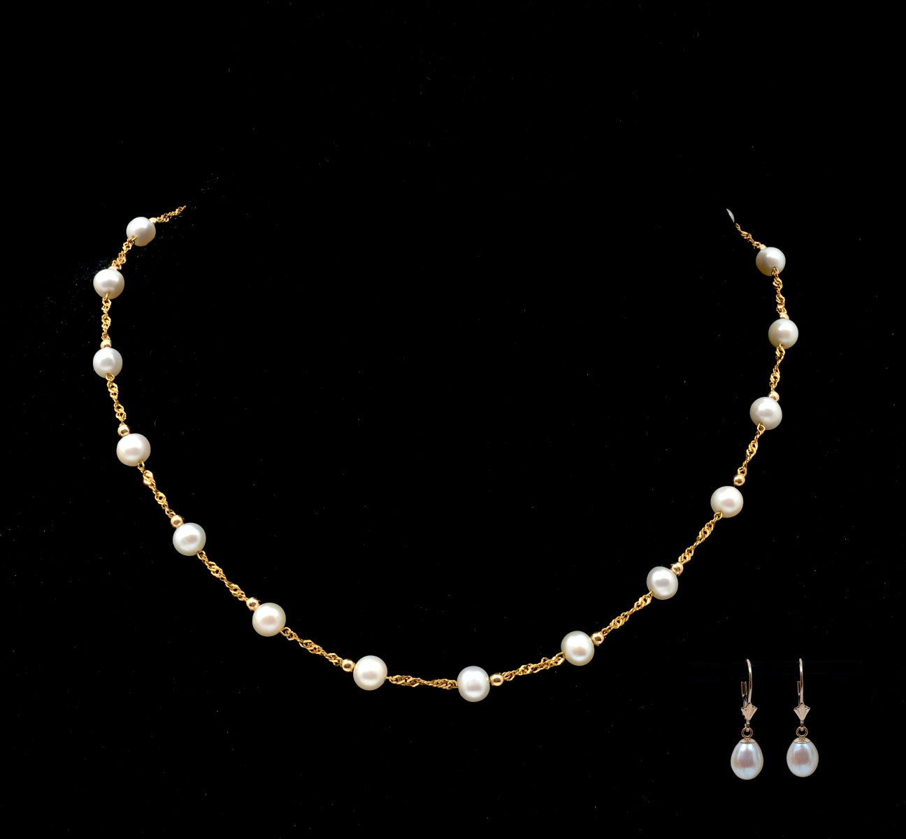 Appraisal: K PEARL NECKLACE AND EARRINGS '' yellow gold stylized rope