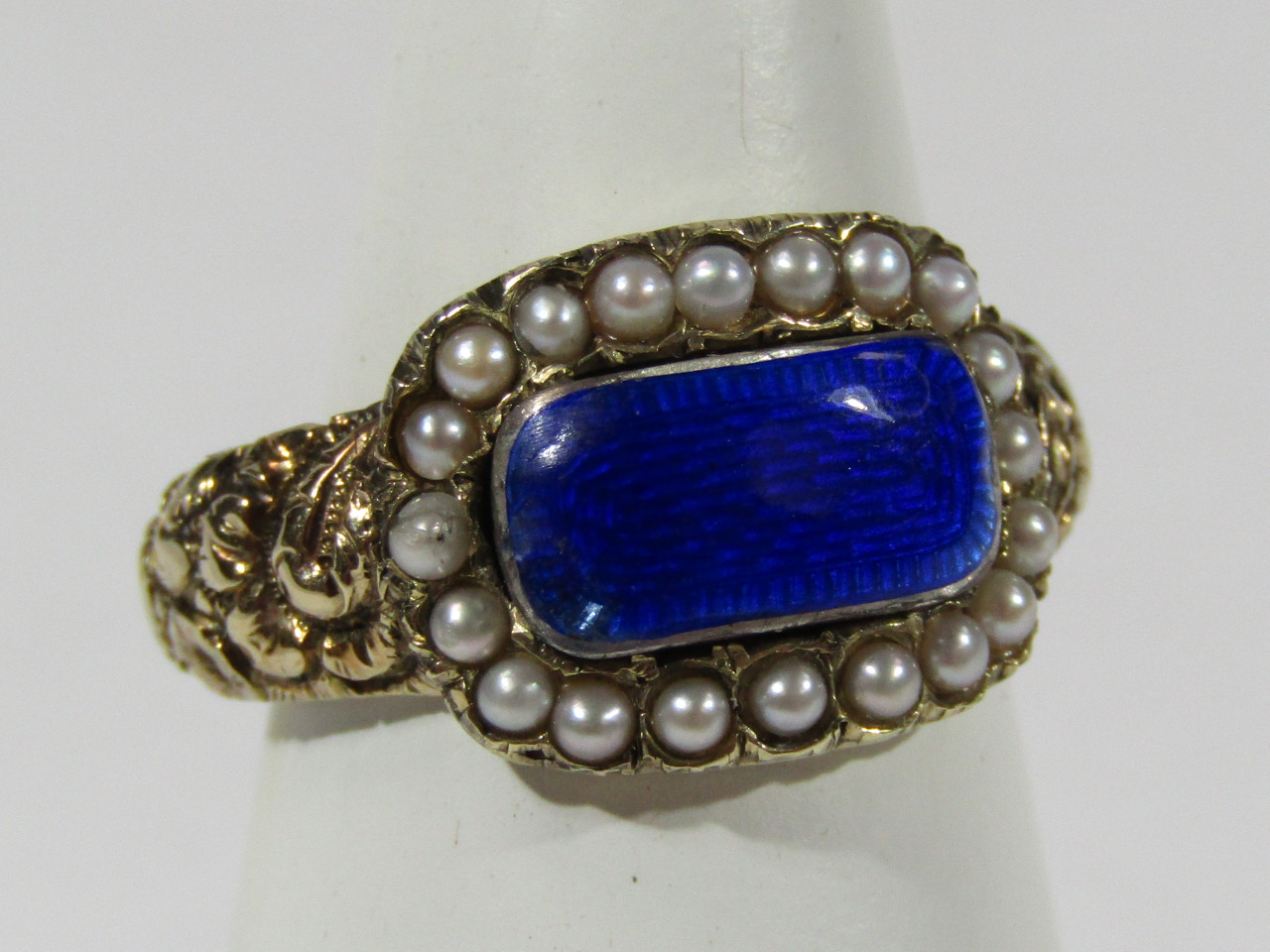 Appraisal: A George IV memorial ring with blue enamel head surrounded