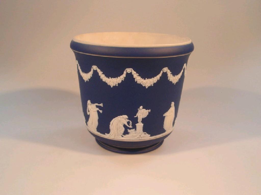 Appraisal: An Adams blue jasper ware jardiniere decorated with classical figures