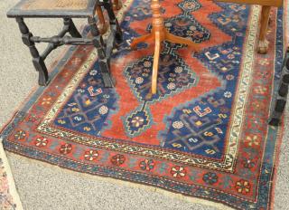 Appraisal: Caucasian Oriental throw rug late th to early th century