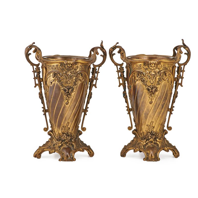 Appraisal: PAIR OF CONTINENTAL BRONZE URNS Chased foliate rococo design with