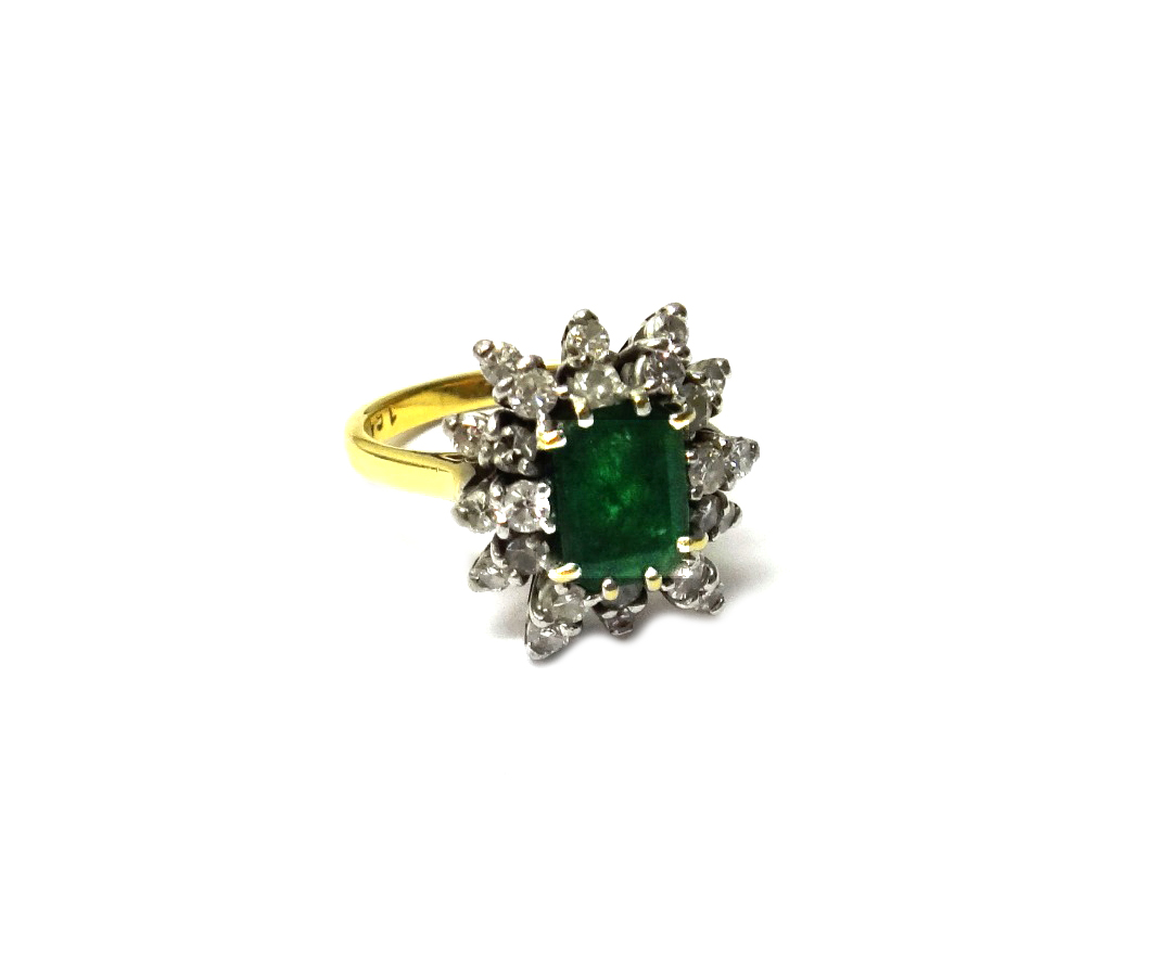 Appraisal: An ct gold emerald and diamond set cluster ring claw