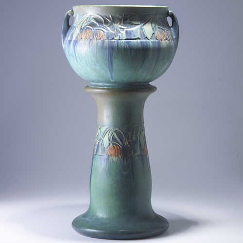 Appraisal: ROSEVILLE Green Baneda jardiniere and pedestal set Restoration to rim