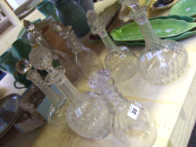 Appraisal: A pair of Victorian three ring glass decanters and stoppers