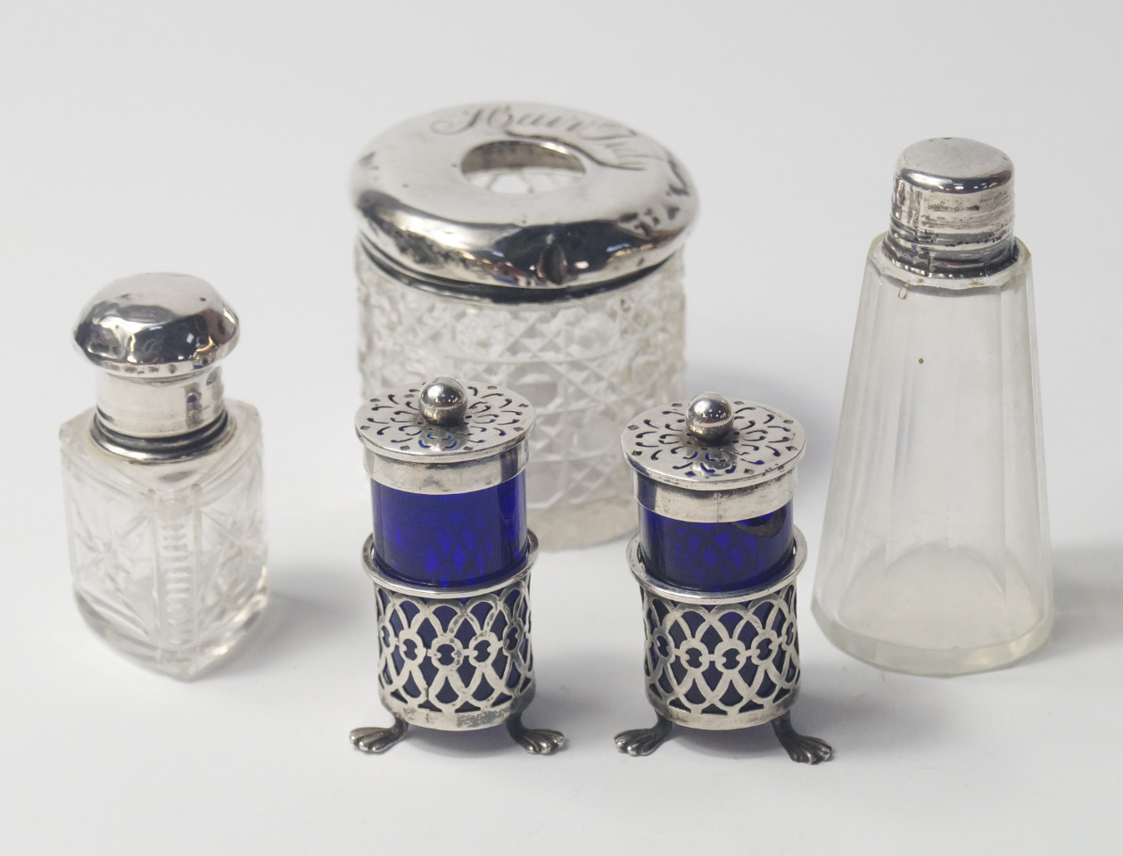 Appraisal: A George V cut glass smelling salts bottle with silver